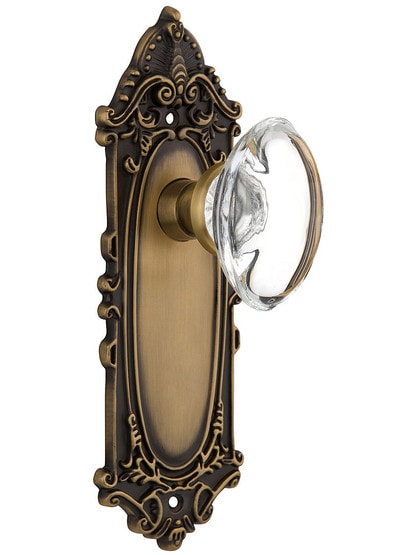 Victorian Plate with Oval Clear Crystal Knob in Antique Brass with .
